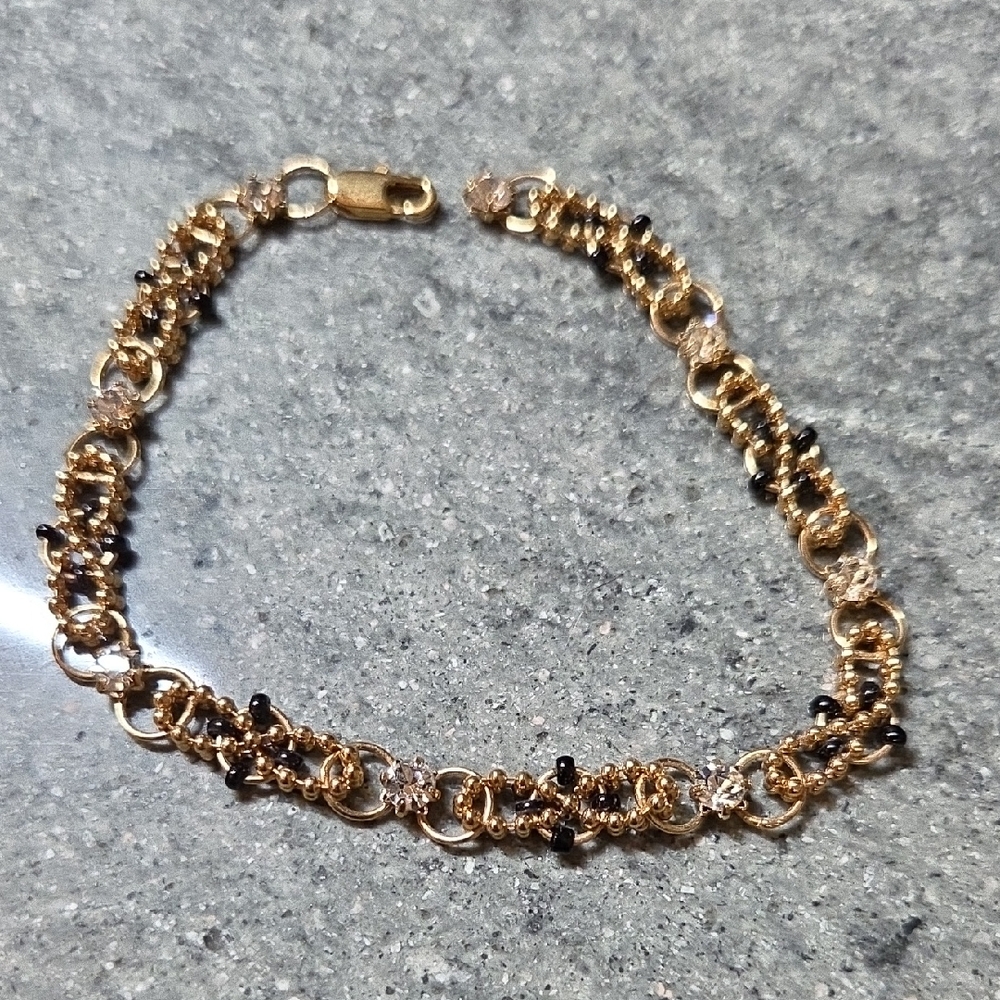 Gold Chain Bracelet with Black Bead Accents